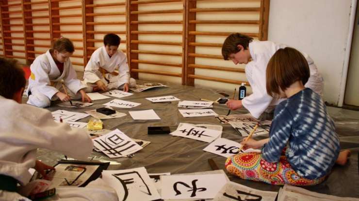 Children aikido seminar with calligraphy